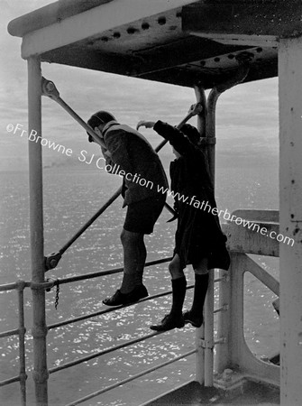 CHILDREN CLIMBING ON RAILINGS OF SS SCOTIA